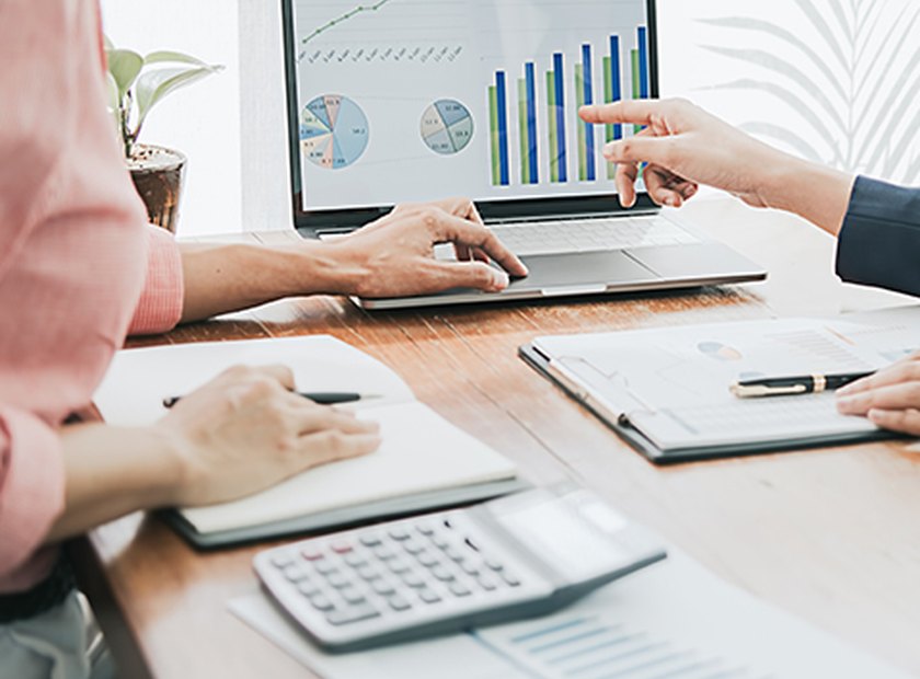 Tax professional reviewing an IRS notice with a client